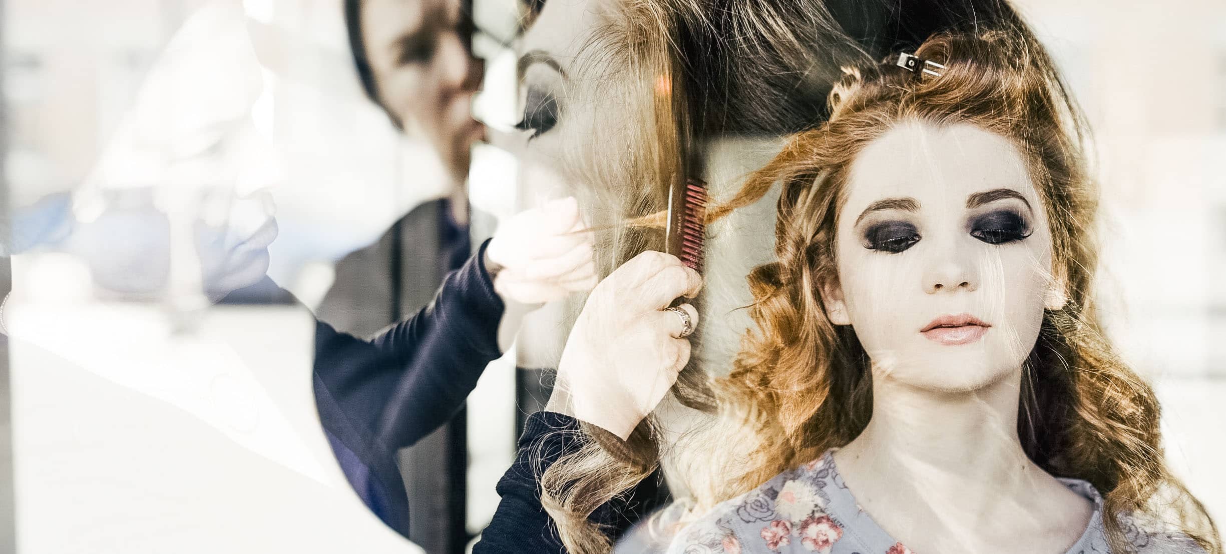 Stylist creates a stunning hair style for her client
