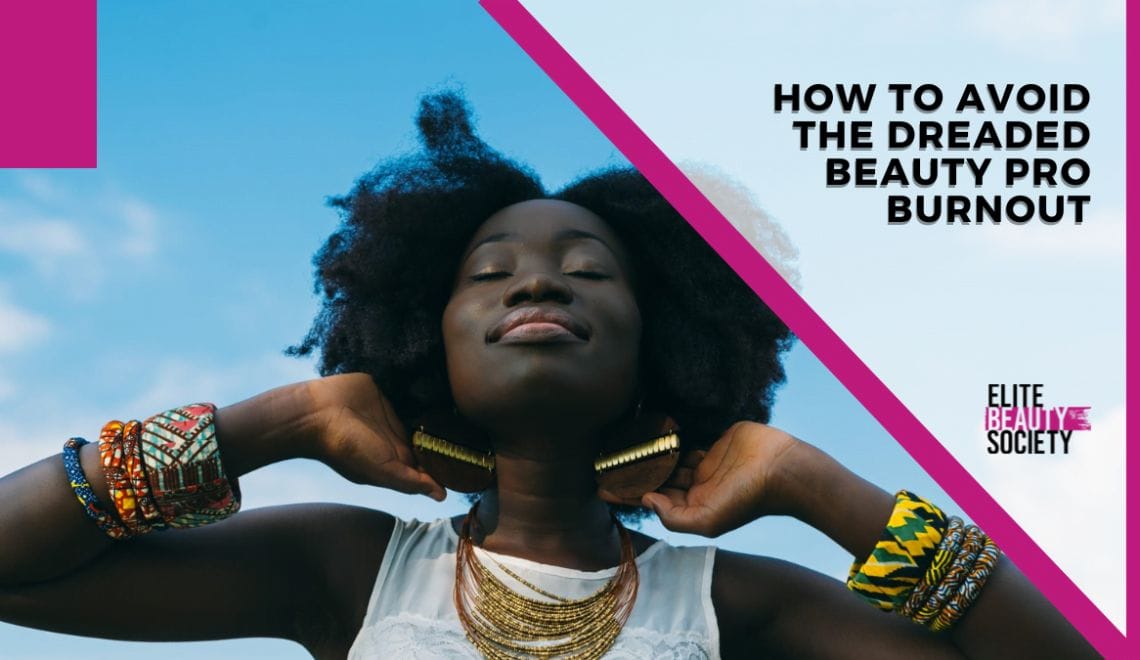 A stylish cosmetologist takes a deep breath outside while practicing boundaries–a must to help her avoid beauty pro burnout.