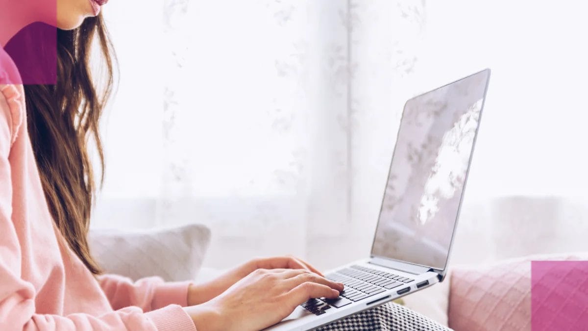 A beauty pro takes to her laptop to update her resume using cosmetology resume tips from her industry.