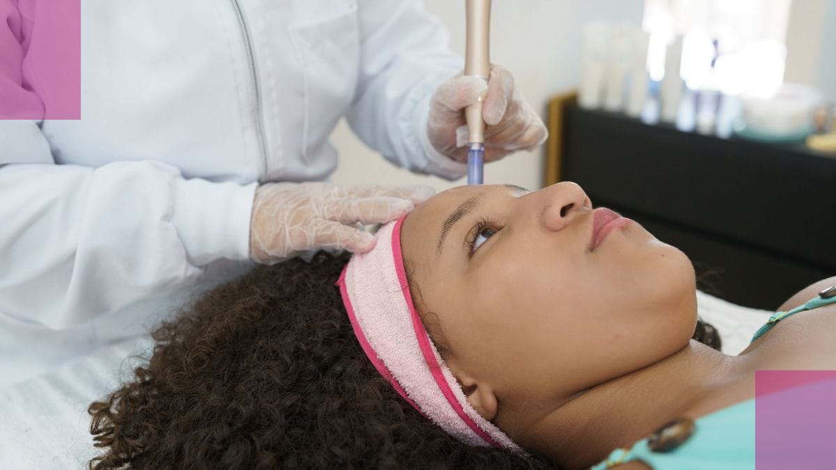 A client sits still while her esthetician applies her treatment.