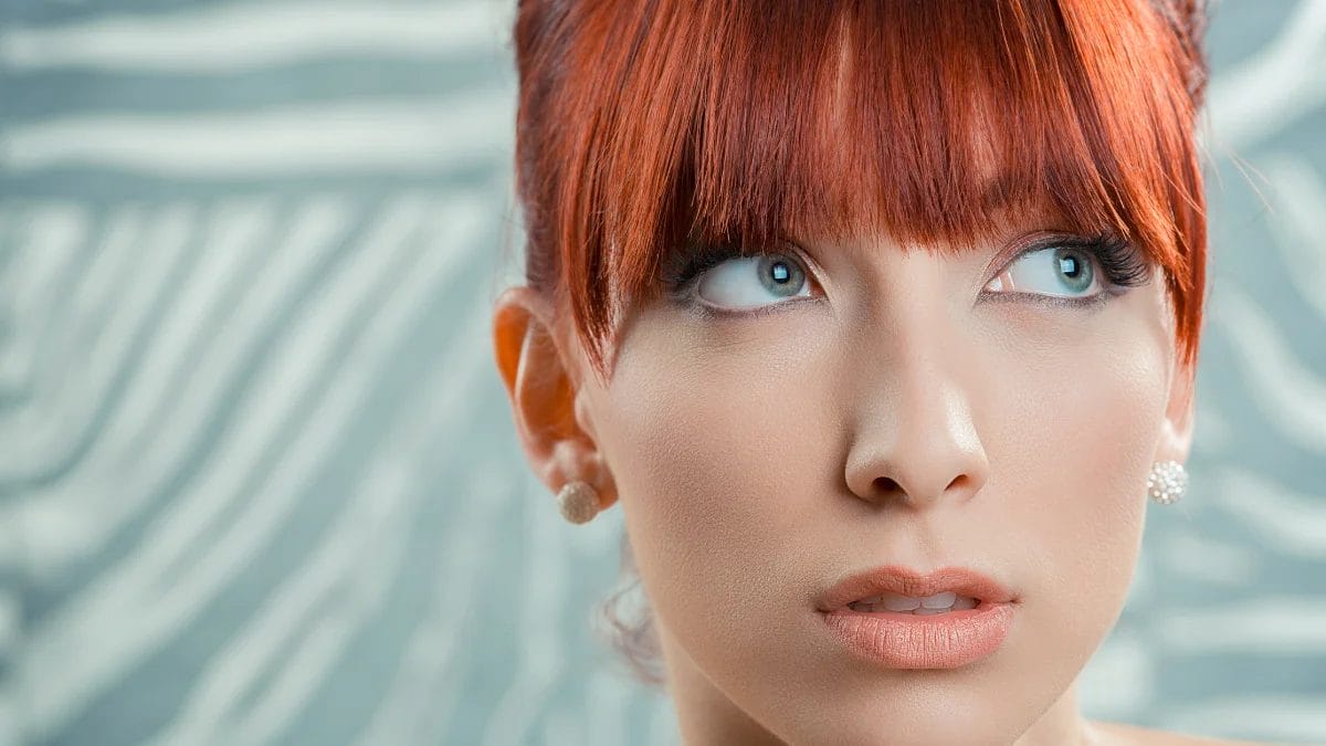 A client shows off her NYE look–new bangs.