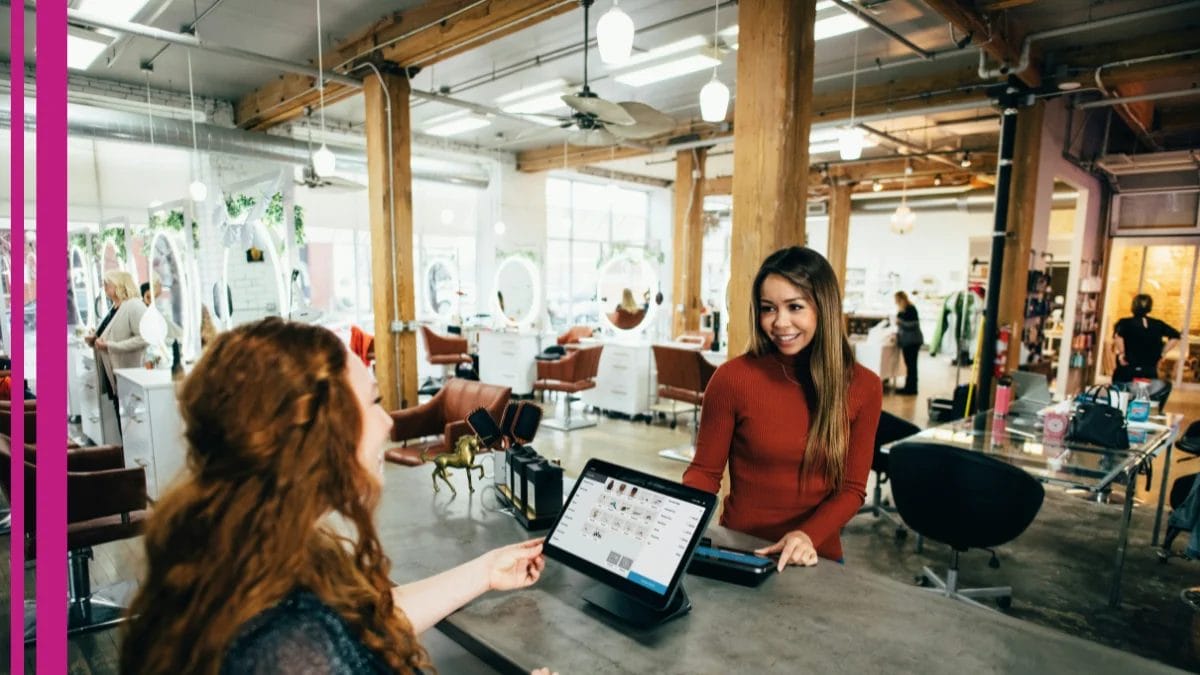 A stylist takes information from her client to help her later in her tax documents, something she learned by getting her frequently asked tax questions answered.