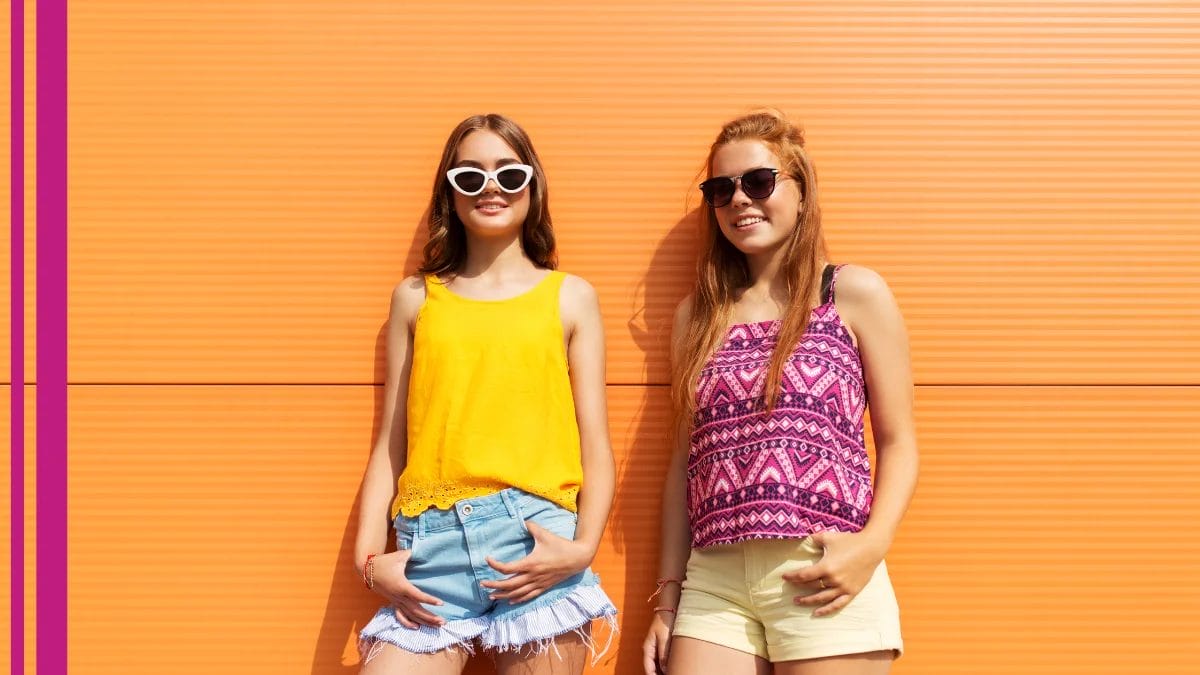 Two girls try out their stylist's beauty pro trends for hydration during hot summer holidays.