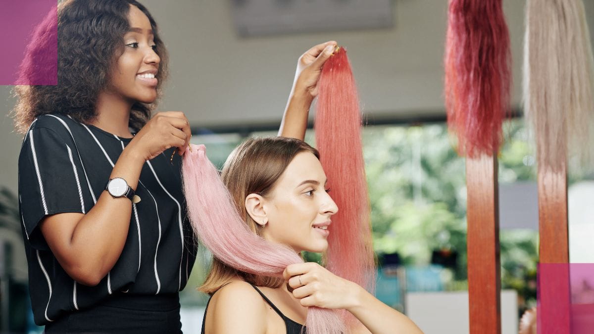 A walk-in client talks over her extensions with her new stylist–an experience built into the client acquisition process. 