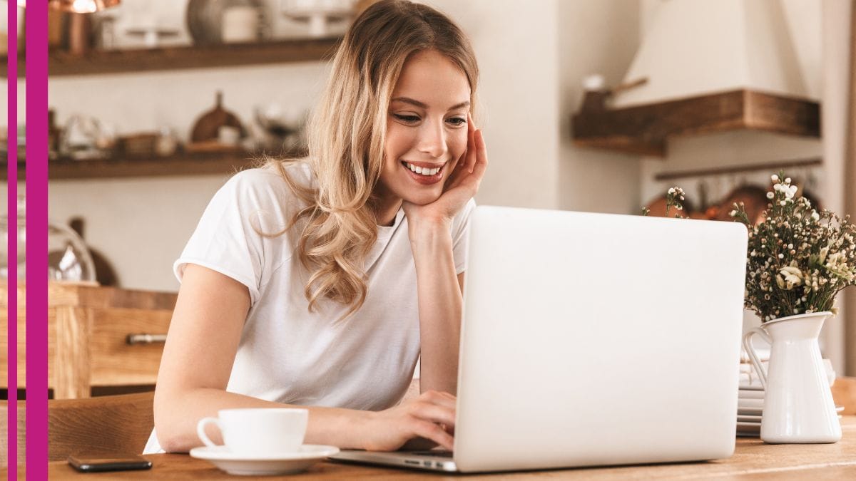 A stylist smiles and checks her chat GPT – wondering how she can use AI for business to expedite her marketing efforts.