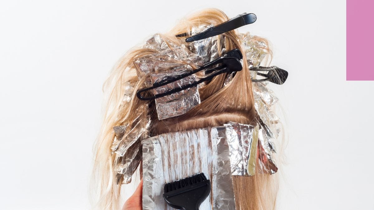 A client's hair is set with all the foil for her color session – a long process that makes a beauty pro how much does a cosmetologist make?
