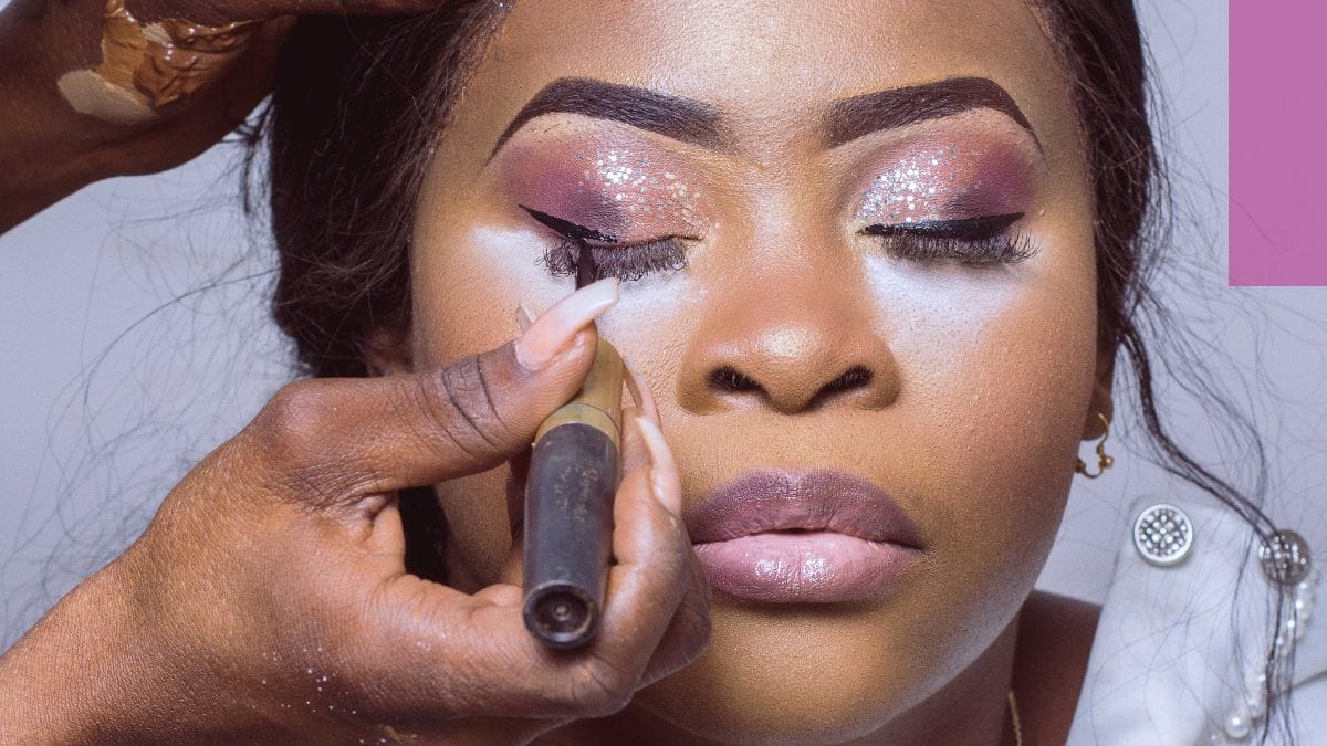 A makeup artist shows off her skills, wondering how she ever questioned is cosmetology a good career path.