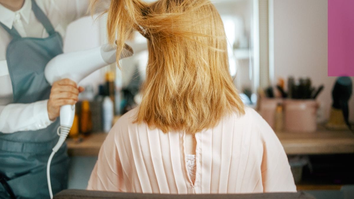 classic-blowout-style A client gets her hair blow dryed for her classic blowout.