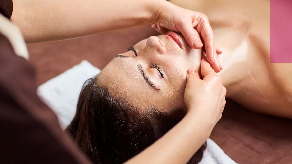 A client gets a prenatal massage during her baby bump facial.