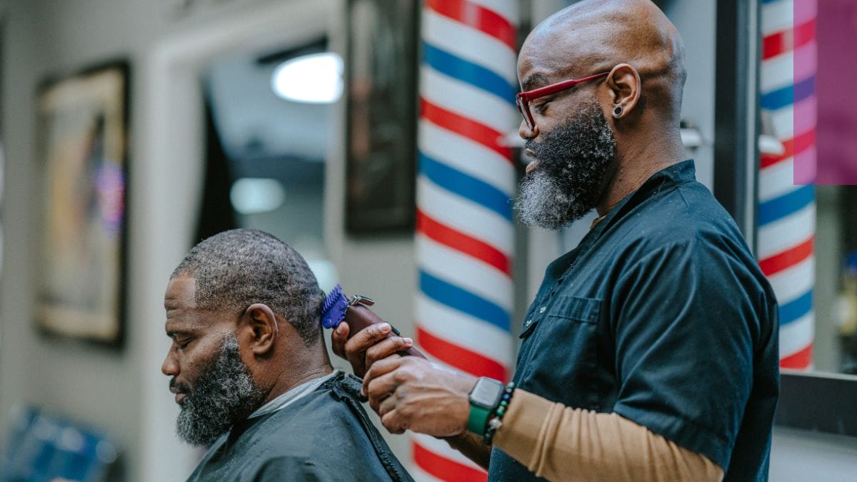 A barber nicks his client's head during a cut, but isn't worried –&nbsp;he has barber liability insurance.