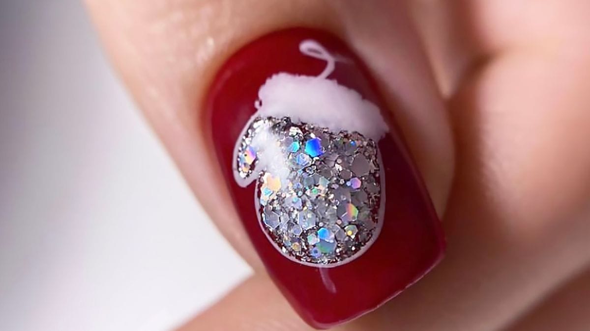 glitter and red holiday nail design