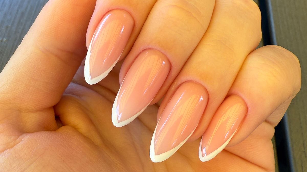 barely-there, ultra thin French tips nail design for 2026 brides