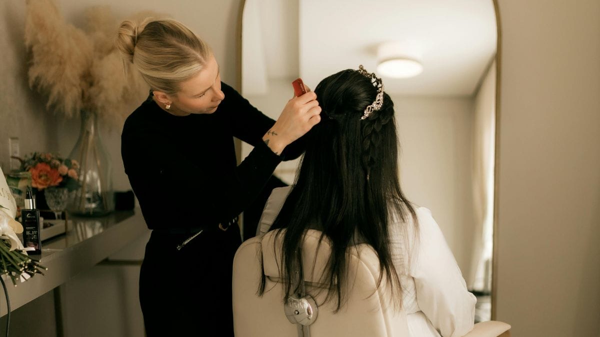 A stylist talks to her bridal client about self-employment tax deductions.