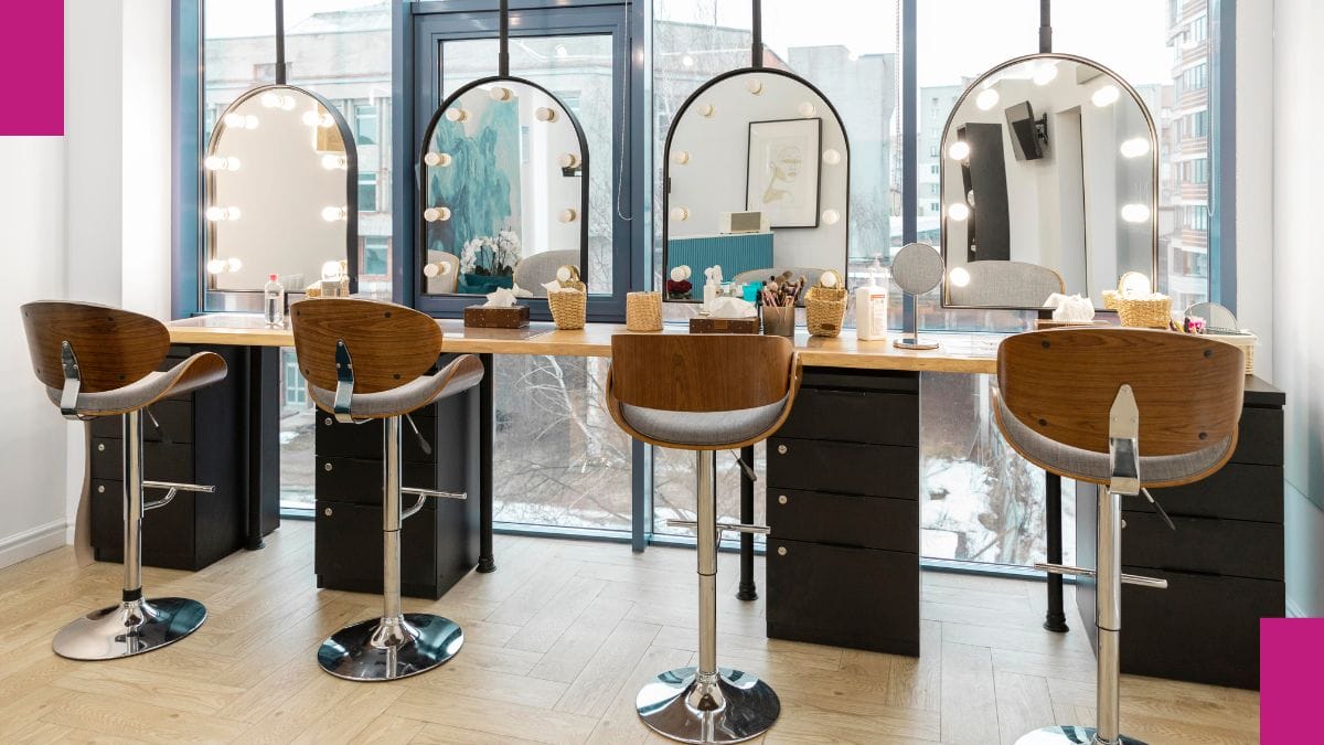 Chairs, salon mirrors, and equipment are shown – all considered self-employment tax deductions.